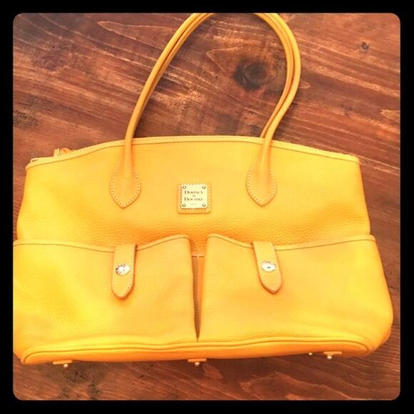 Dooney and Bourke leather pocket book. - Picture 1 of 8